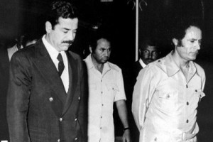 Saddam Hussein (right) and Mu'ammar al-Qaddafi in their salad days (circa 1985).